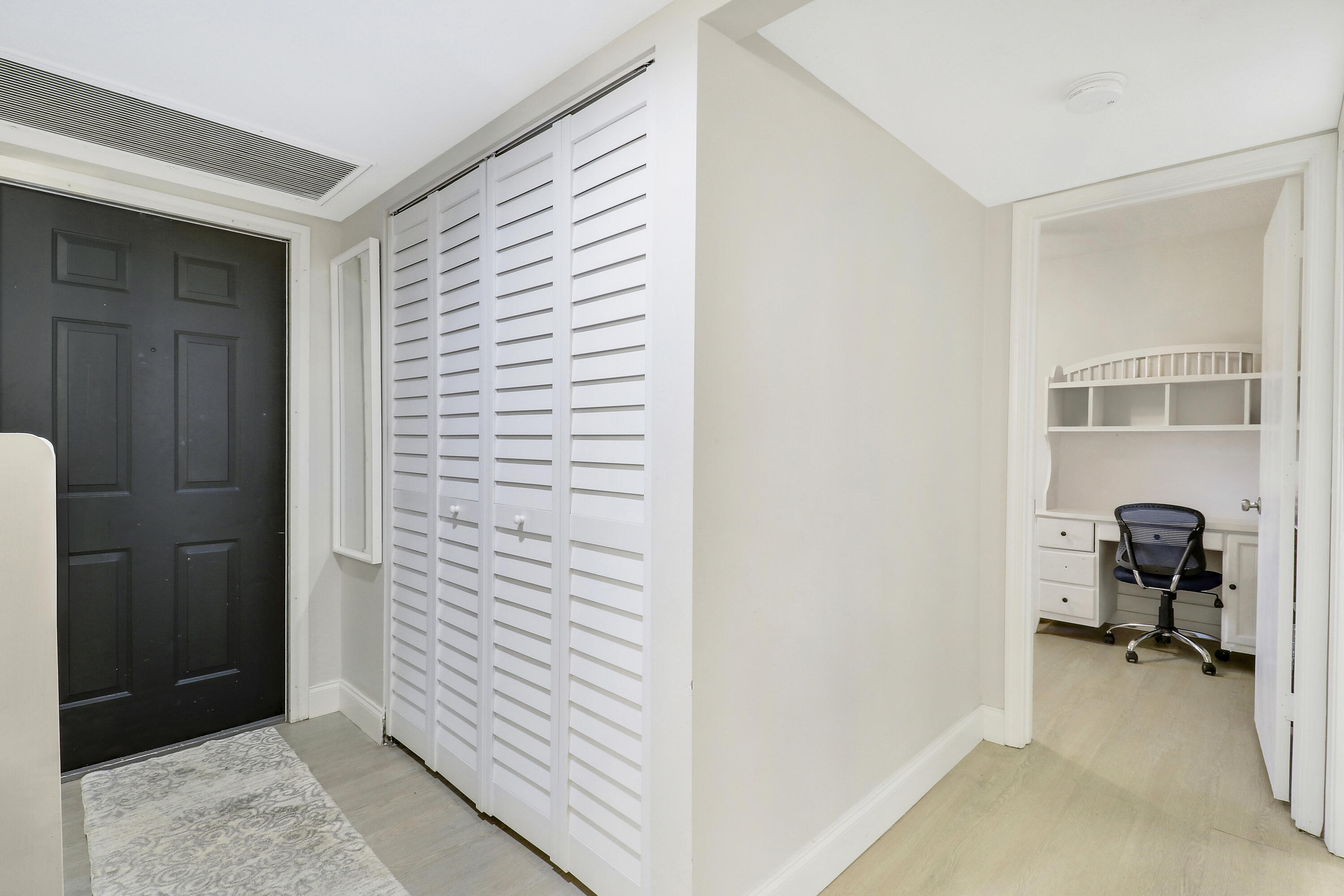 1200 Southeast Parkview Place, Unit F3 Stuart, FL 34994 - Photo 8 of 32 a view of a room with closet