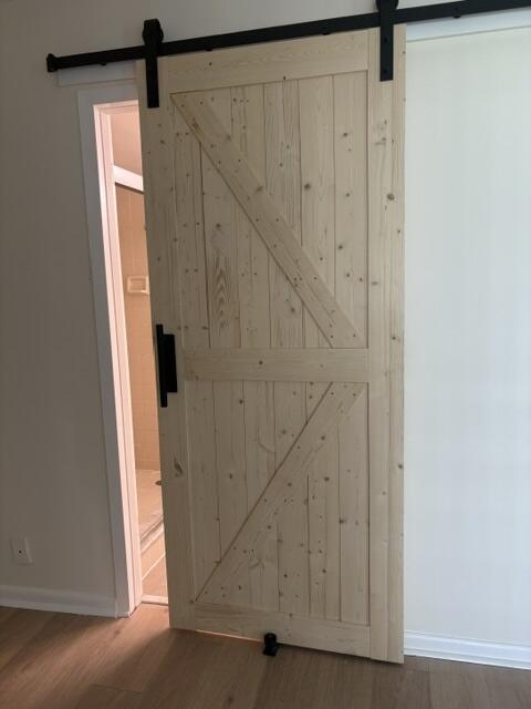 230 Fanshaw F, Unit F230 Boca Raton, FL 33434 - Photo 6 of 15 MASTERBATHROOM DOOR