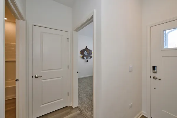 a view of an empty room with a window