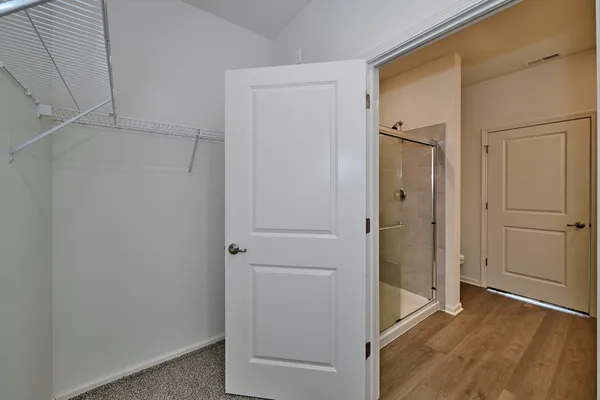 a bathroom with a mirror and a sink