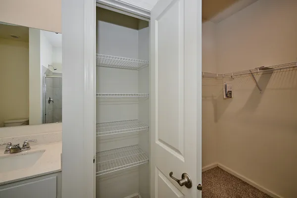 a room with gym equipment and a window