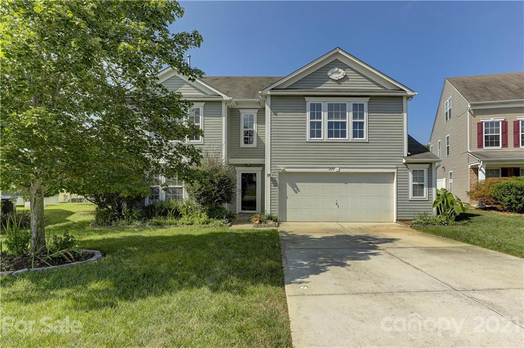 2170 Durand Road, Unit 40 Fort Mill, SC 29715 - Photo 1 of 48 a front view of a house with a yard