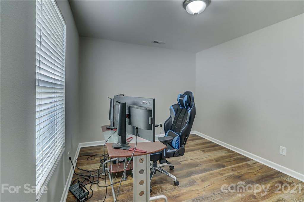 2170 Durand Road, Unit 40 Fort Mill, SC 29715 - Photo 33 of 48 a view of a workspace with furniture and wooden floor