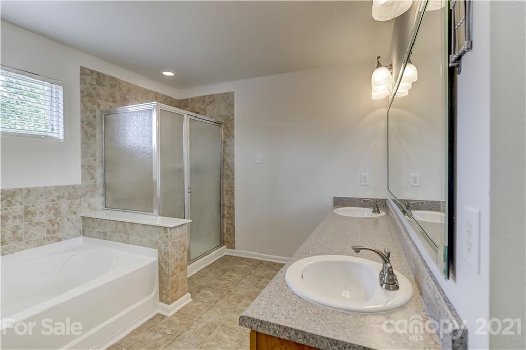 2170 Durand Road, Unit 40 Fort Mill, SC 29715 - Photo 42 of 48 a bathroom with a sink and a mirror