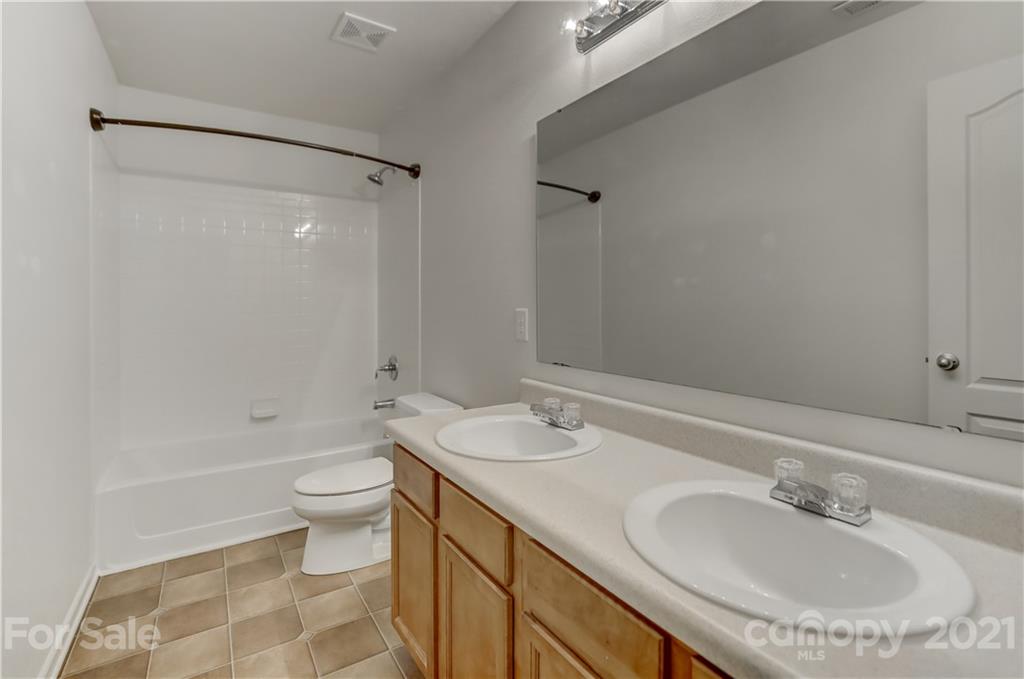 2170 Durand Road, Unit 40 Fort Mill, SC 29715 - Photo 44 of 48 a bathroom with a sink toilet tub and shower