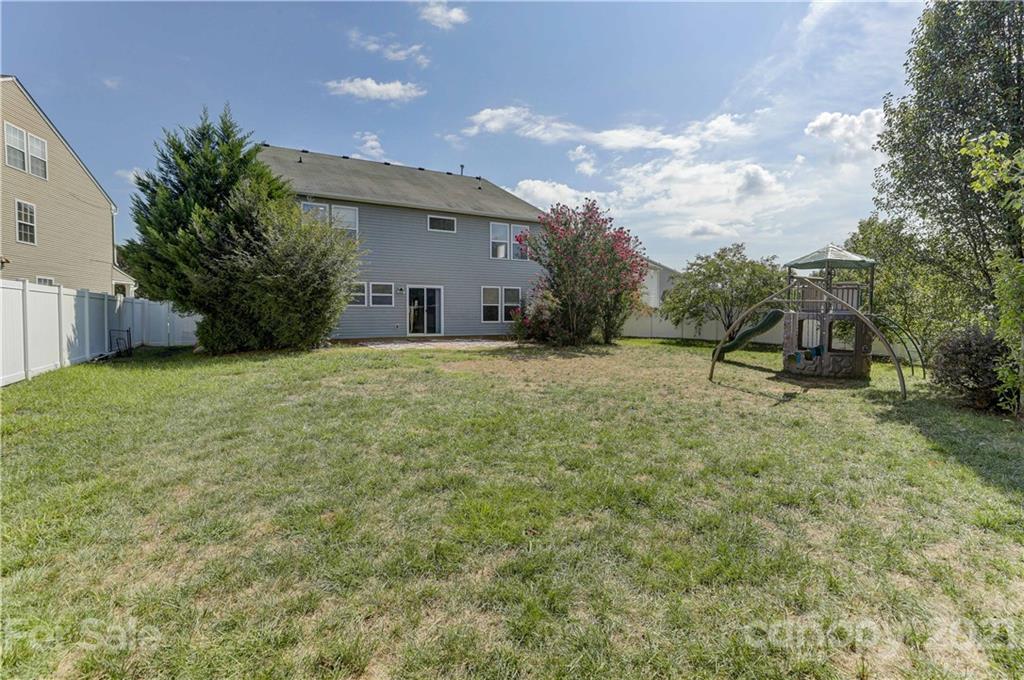2170 Durand Road, Unit 40 Fort Mill, SC 29715 - Photo 46 of 48 a view of a house with a yard and a tree