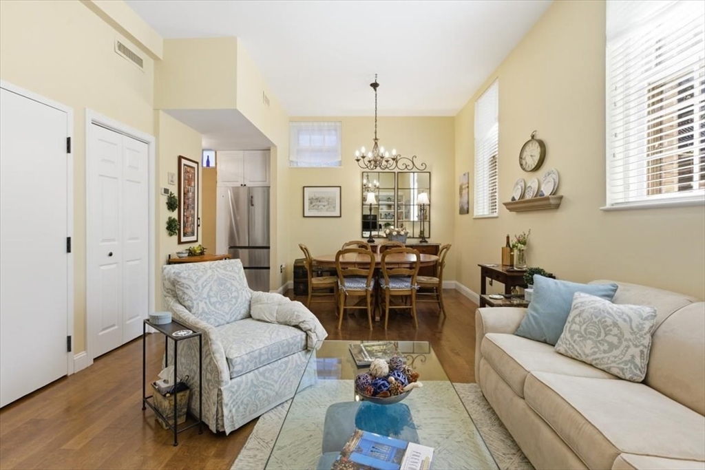 65 Glen Road, Unit H1 Brookline, MA 02445 - Photo 8 of 39 a living room with furniture and wooden floor