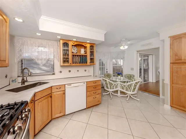 a large kitchen with a large window