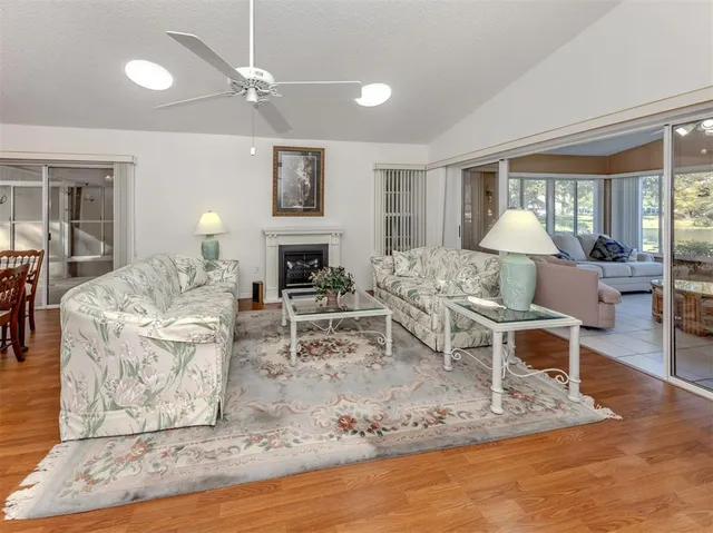 a living room with furniture and a table