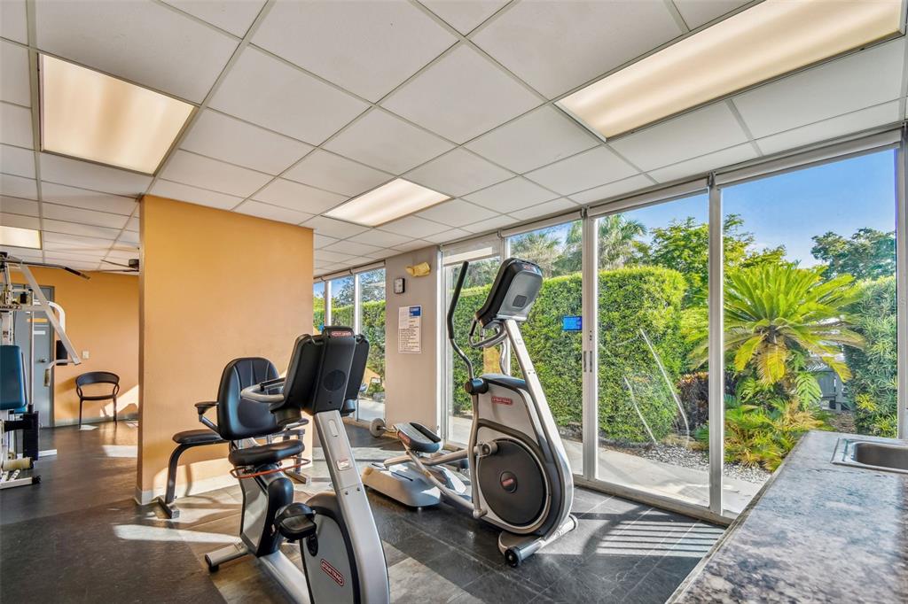 1000 Riverside Drive, Unit B104 Palmetto, FL 34221 - Photo 27 of 36 a view of a room with gym equipment