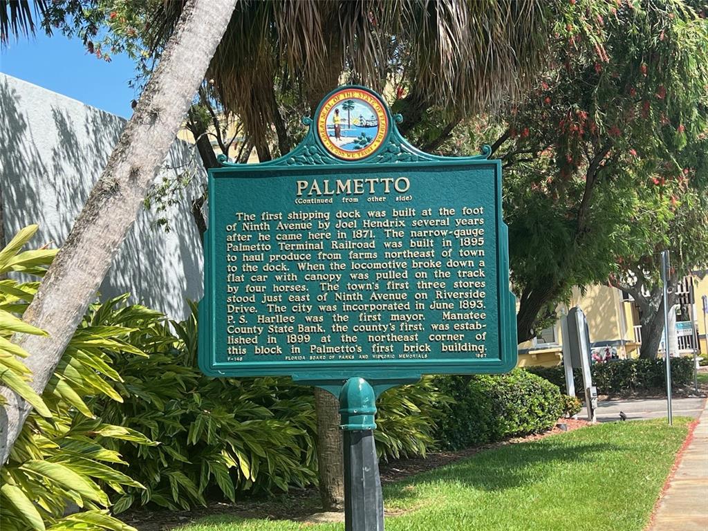 1000 Riverside Drive, Unit B104 Palmetto, FL 34221 - Photo 33 of 36 a sign on the side of a building