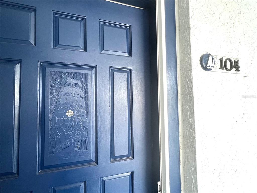 1000 Riverside Drive, Unit B104 Palmetto, FL 34221 - Photo 6 of 36 a view of a hallway with a elevator