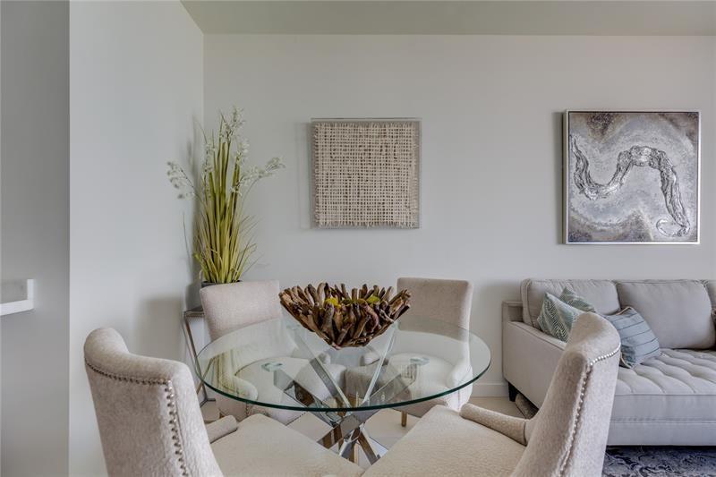401 North Birch Road, Unit 1012 Fort Lauderdale, FL 33304 - Photo 18 of 44 a living room with furniture and a potted plant
