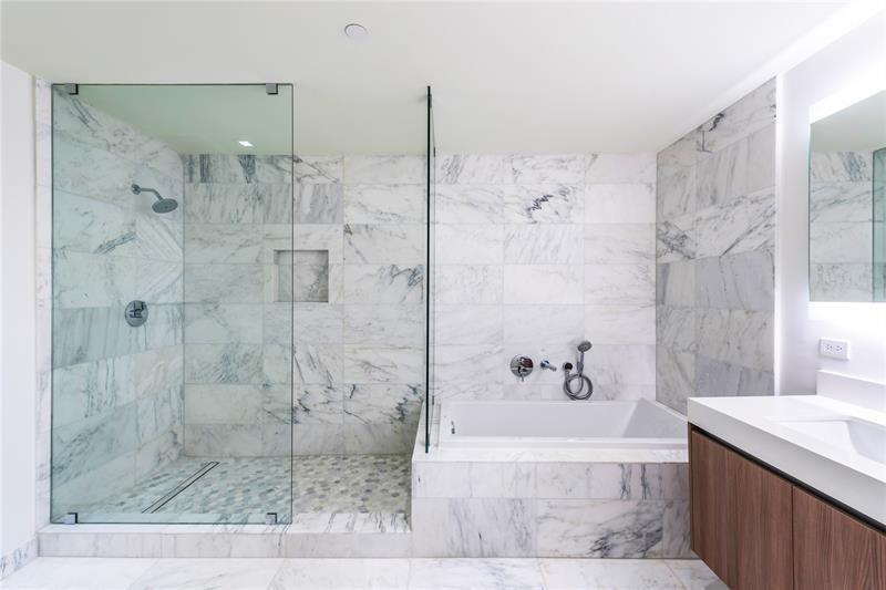 401 North Birch Road, Unit 1012 Fort Lauderdale, FL 33304 - Photo 39 of 44 a bathroom with a bathtub and shower