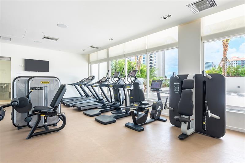 401 North Birch Road, Unit 1012 Fort Lauderdale, FL 33304 - Photo 41 of 44 a view of a room with gym equipment