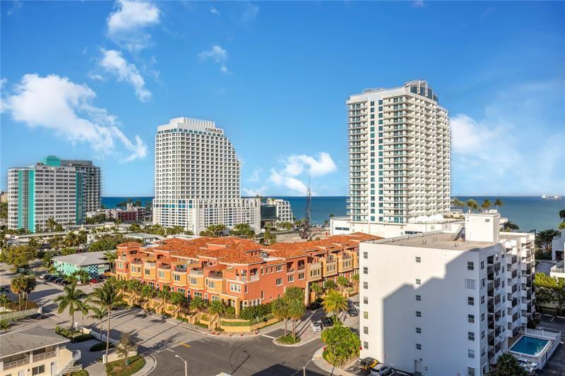 401 North Birch Road, Unit 1012 Fort Lauderdale, FL 33304 - Photo 5 of 44 a large building with a large window