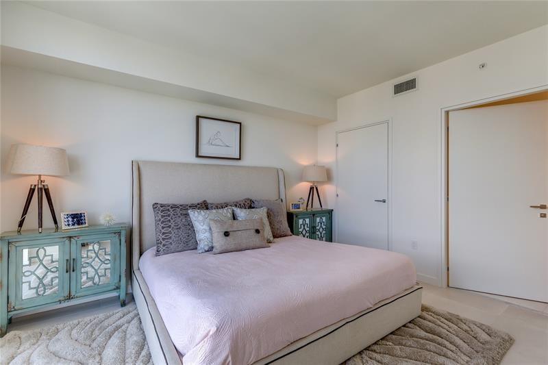 401 North Birch Road, Unit 1012 Fort Lauderdale, FL 33304 - Photo 10 of 44 a bedroom with a bed and a window