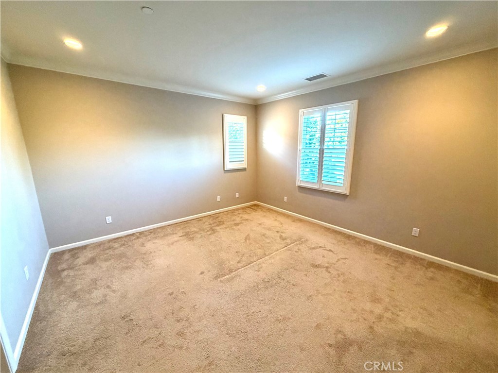 56 Strawberry Grove Irvine, CA 92620 - Photo 18 of 24 an empty room with windows