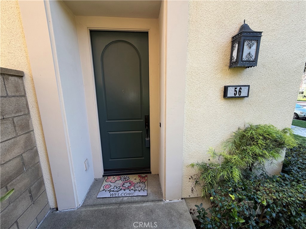 56 Strawberry Grove Irvine, CA 92620 - Photo 24 of 24 a bathroom with a shower and a sink