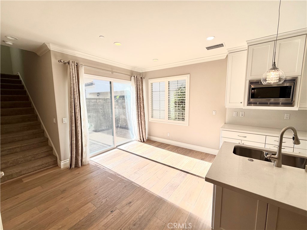 56 Strawberry Grove Irvine, CA 92620 - Photo 9 of 24 a bathroom with a sink and a mirror