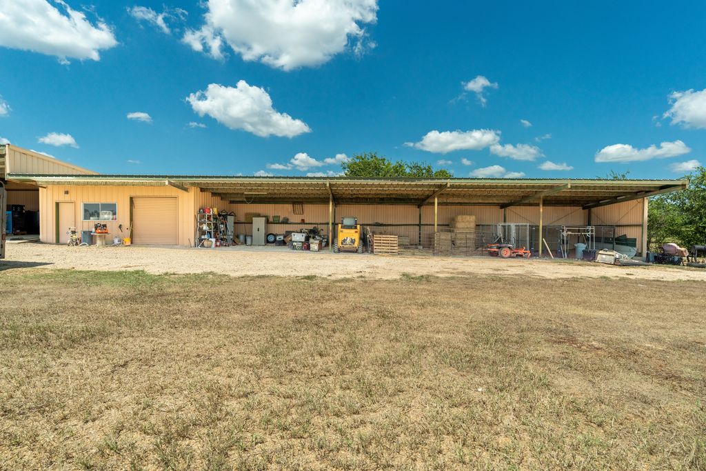 3550 County Road 245 Florence, TX 76527 - Photo 23 of 38 a view of a swimming pool with an outdoor seating