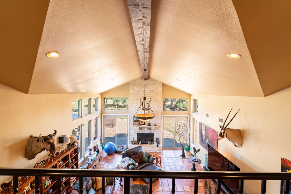 3550 County Road 245 Florence, TX 76527 - Photo 29 of 38 Soaring Ceilings in Great Room with Floor to Ceiling Limestone Fireplace with All New Windows 2023
