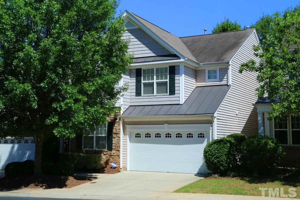 8303 Rubblestone Path Raleigh, NC 27613 - Photo 1 of 25 a view of a house with a yard