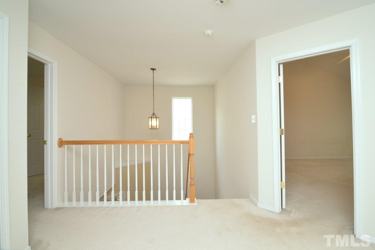 8303 Rubblestone Path Raleigh, NC 27613 - Photo 15 of 25 a view of a hallway
