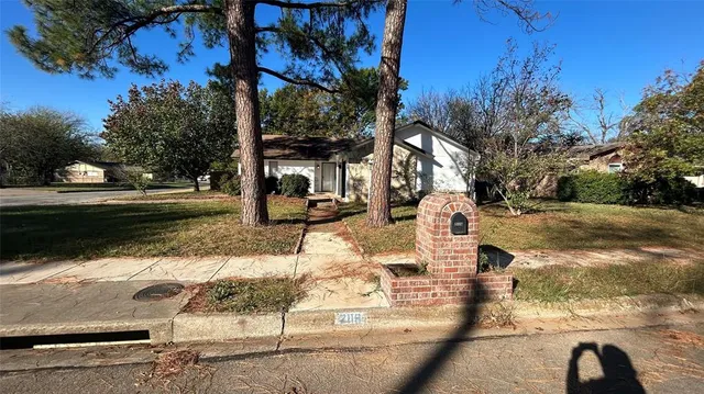 a view of yard along with trees