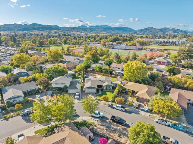 an aerial view of a house with a garden