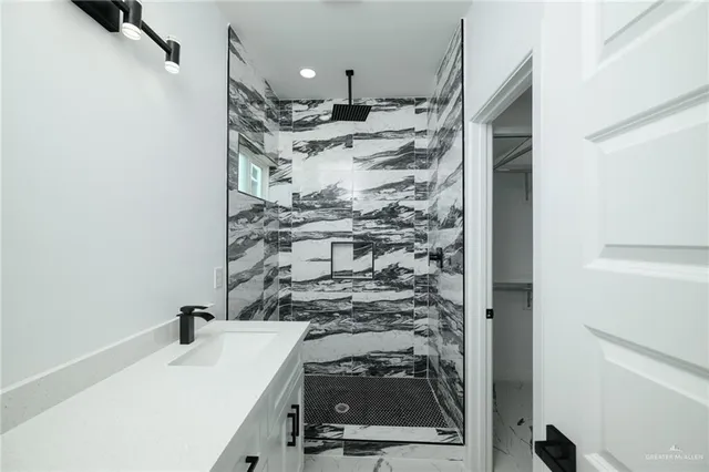 a view of a storage & utility room with a sink