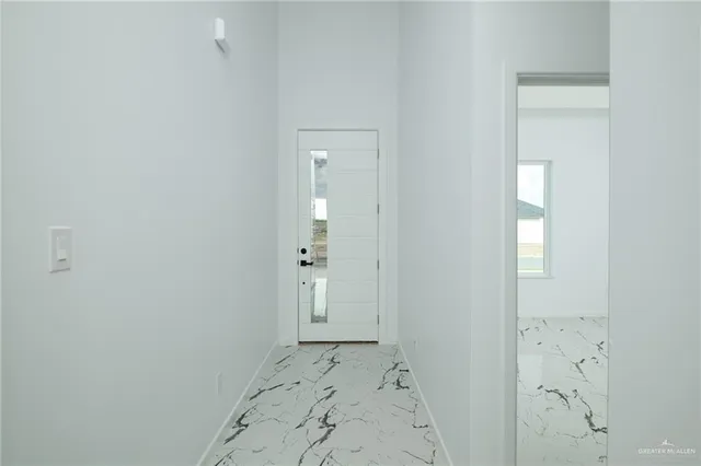 an empty room with windows