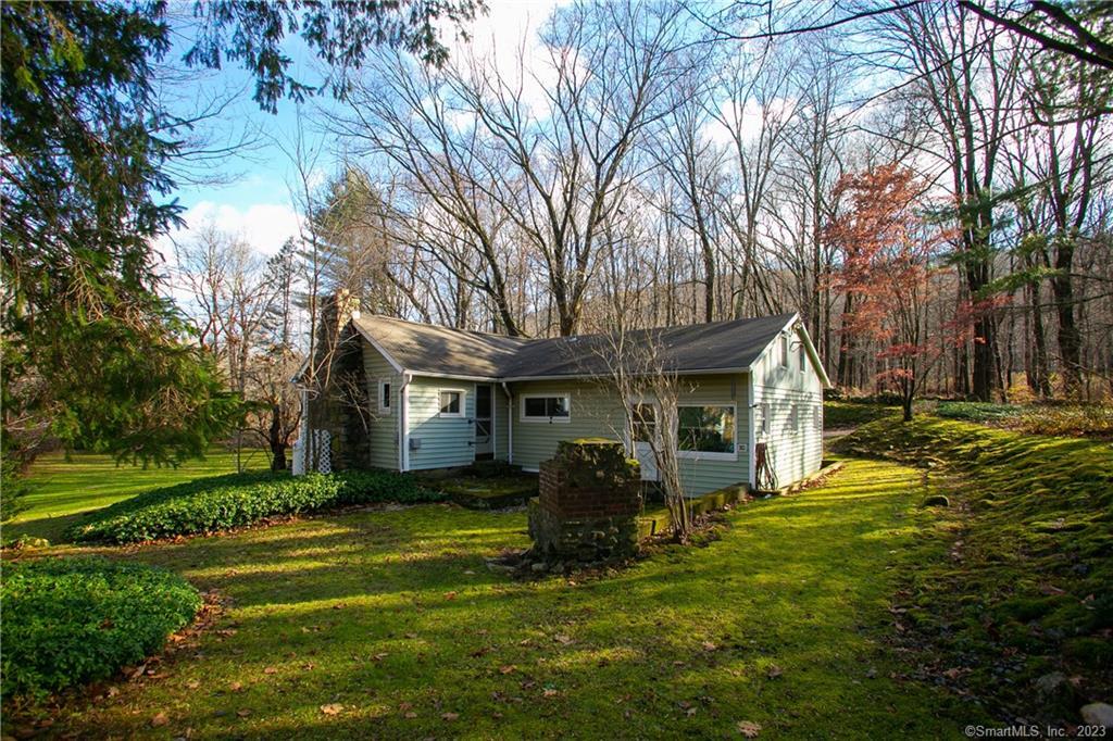 278 B Kent Cornwall Road Kent, CT 06757 - Photo 1 of 1 a view of a house with a big yard and large trees