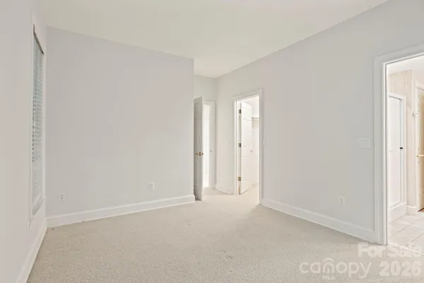a view of balcony with wooden floor