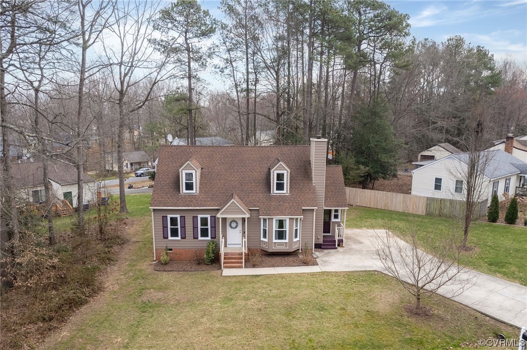 2617 Iverson Road Midlothian, VA 23112 - Photo 1 of 32 an aerial view of a house with a yard