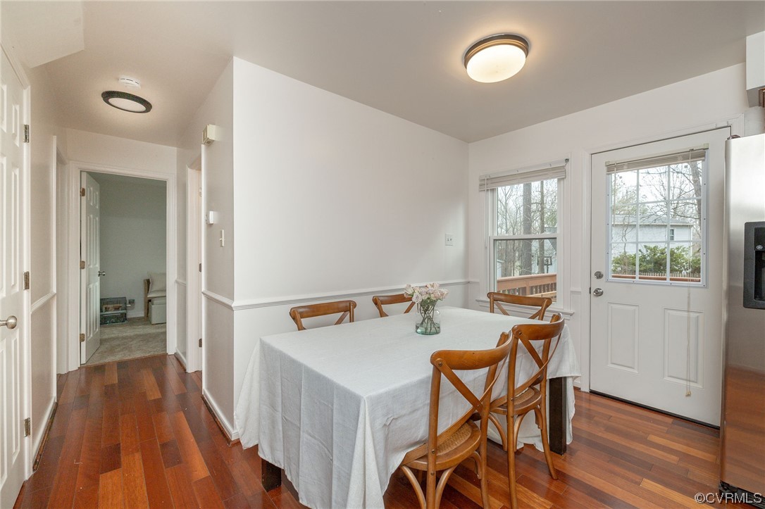 2617 Iverson Road Midlothian, VA 23112 - Photo 13 of 32 a view of a dining room with furniture and wooden floor