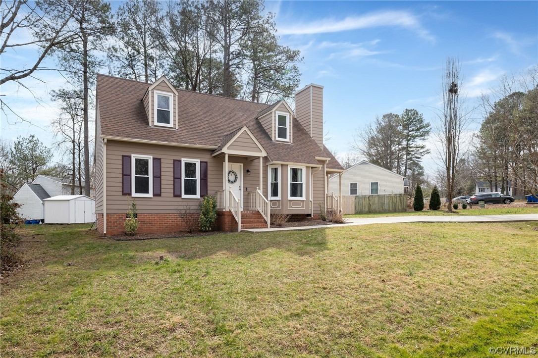 2617 Iverson Road Midlothian, VA 23112 - Photo 3 of 32 a front view of a house with a yard