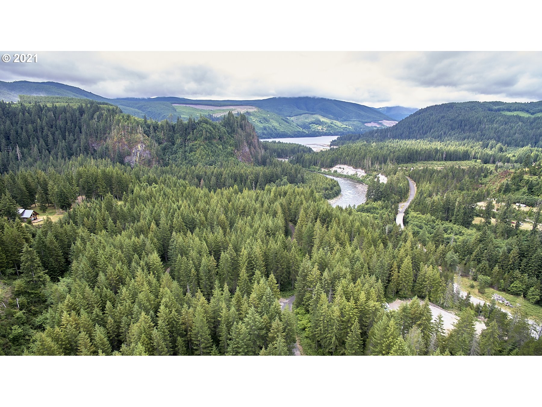 Lahar Lane, Unit 8 Cougar, WA 98616 - Photo 21 of 25 a open area with mountains in the background