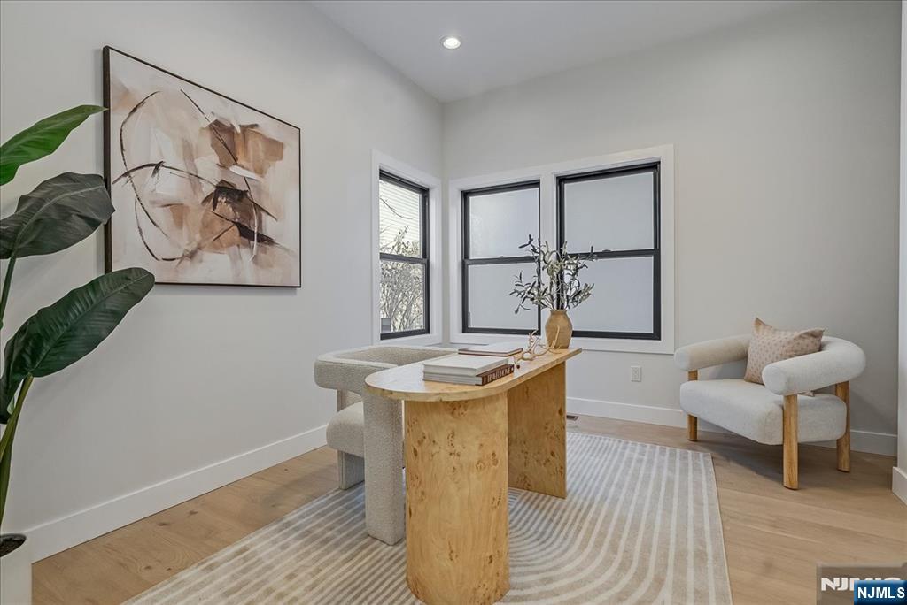 36 James Street Montclair, NJ 07042 - Photo 20 of 48 a living room with a couch and a table