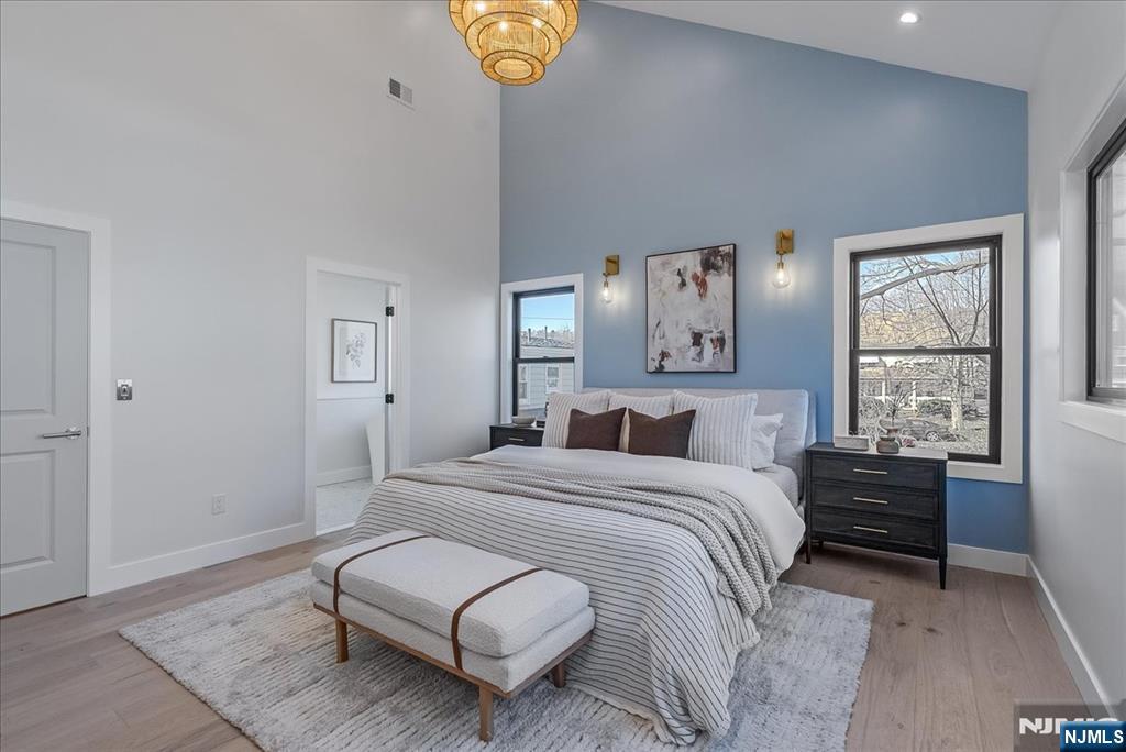 36 James Street Montclair, NJ 07042 - Photo 25 of 48 a bedroom with a bed couch and window