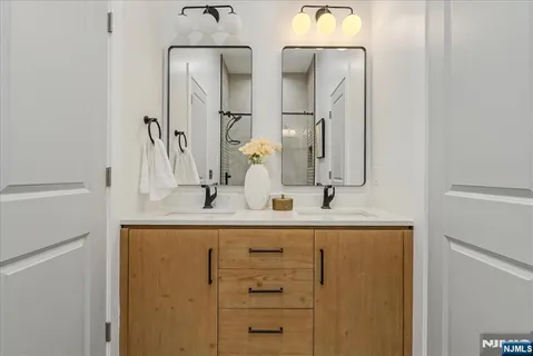 a bathroom with a sink and a mirror