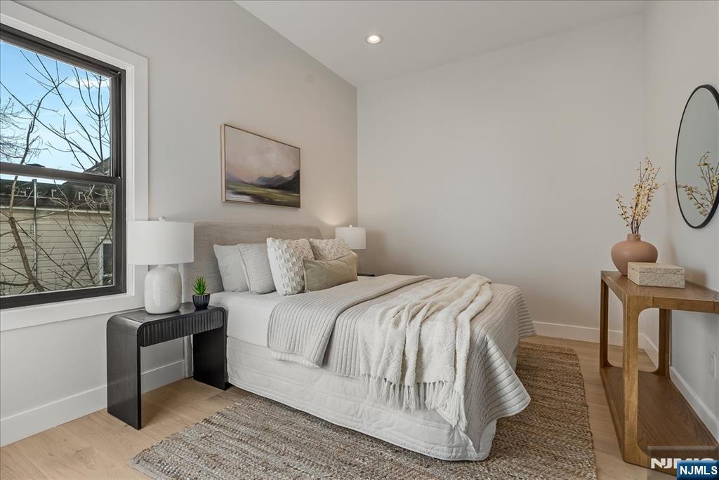36 James Street Montclair, NJ 07042 - Photo 33 of 48 a bedroom with a bed and a window
