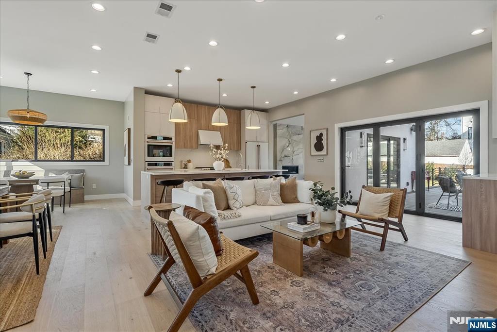36 James Street Montclair, NJ 07042 - Photo 4 of 48 a living room with furniture wooden floor and a large window