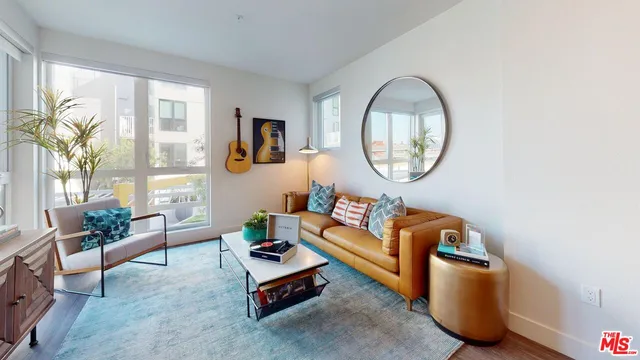 a kitchen with a sink and white stainless steel appliances