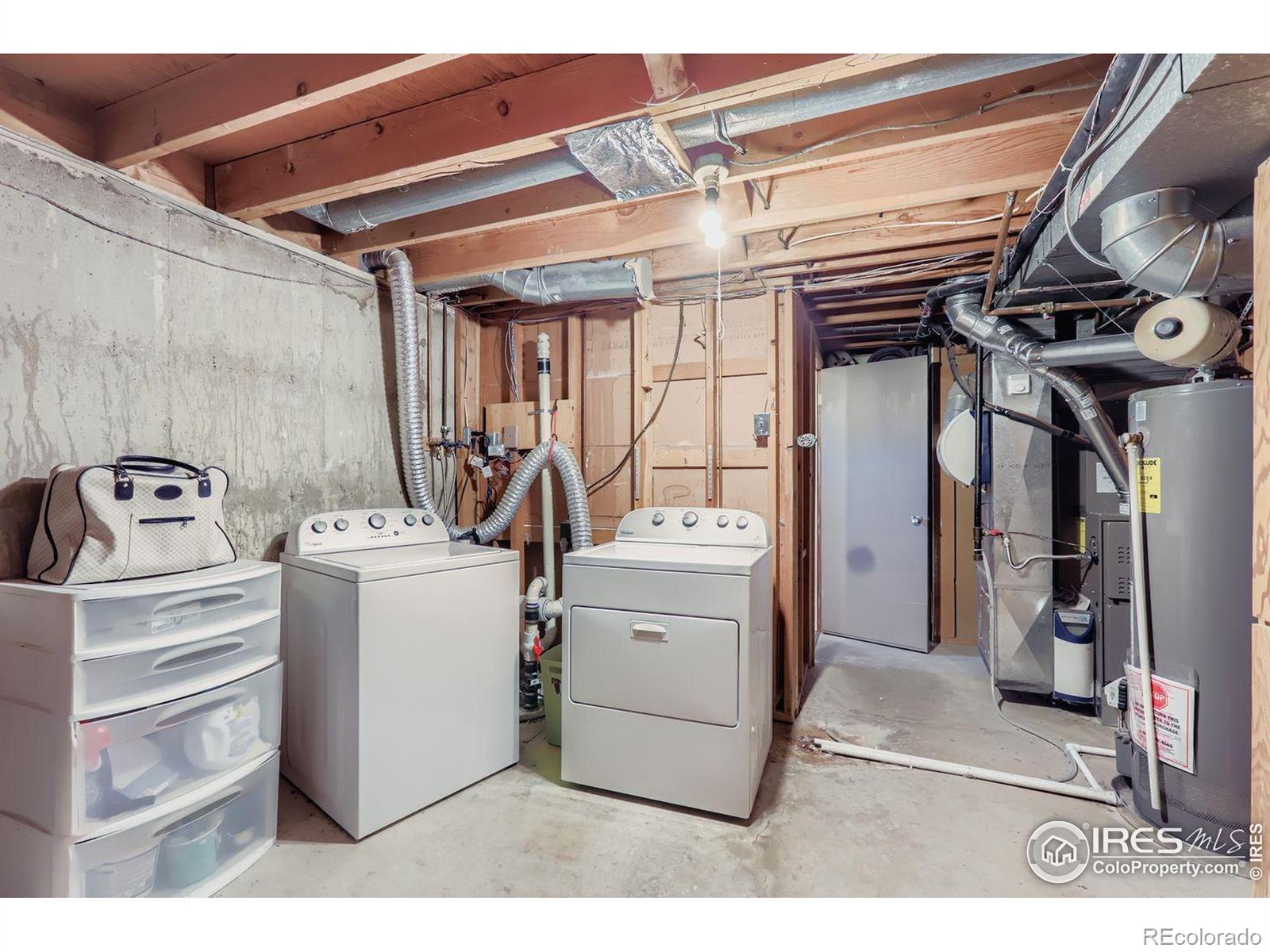 2431 West 24th Street Greeley, CO 80634 - Photo 23 of 32 a utility room with dryer and washer