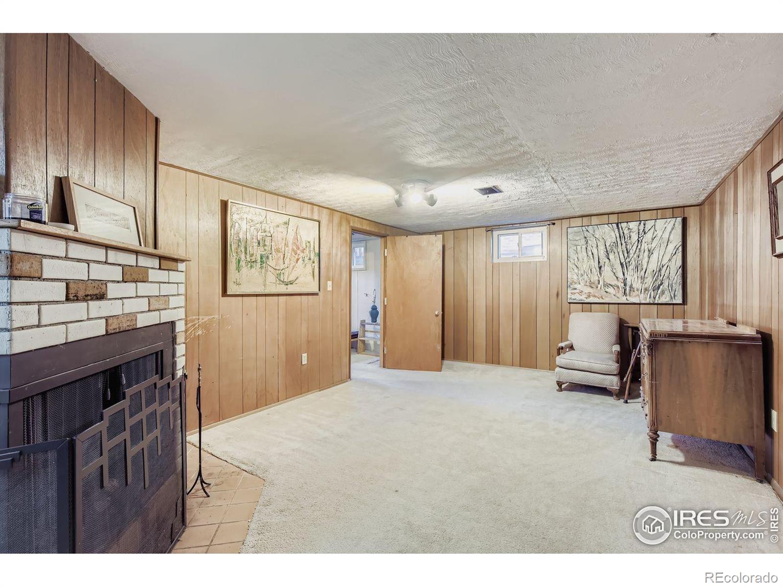 2431 West 24th Street Greeley, CO 80634 - Photo 24 of 32 a bedroom with furniture and windows