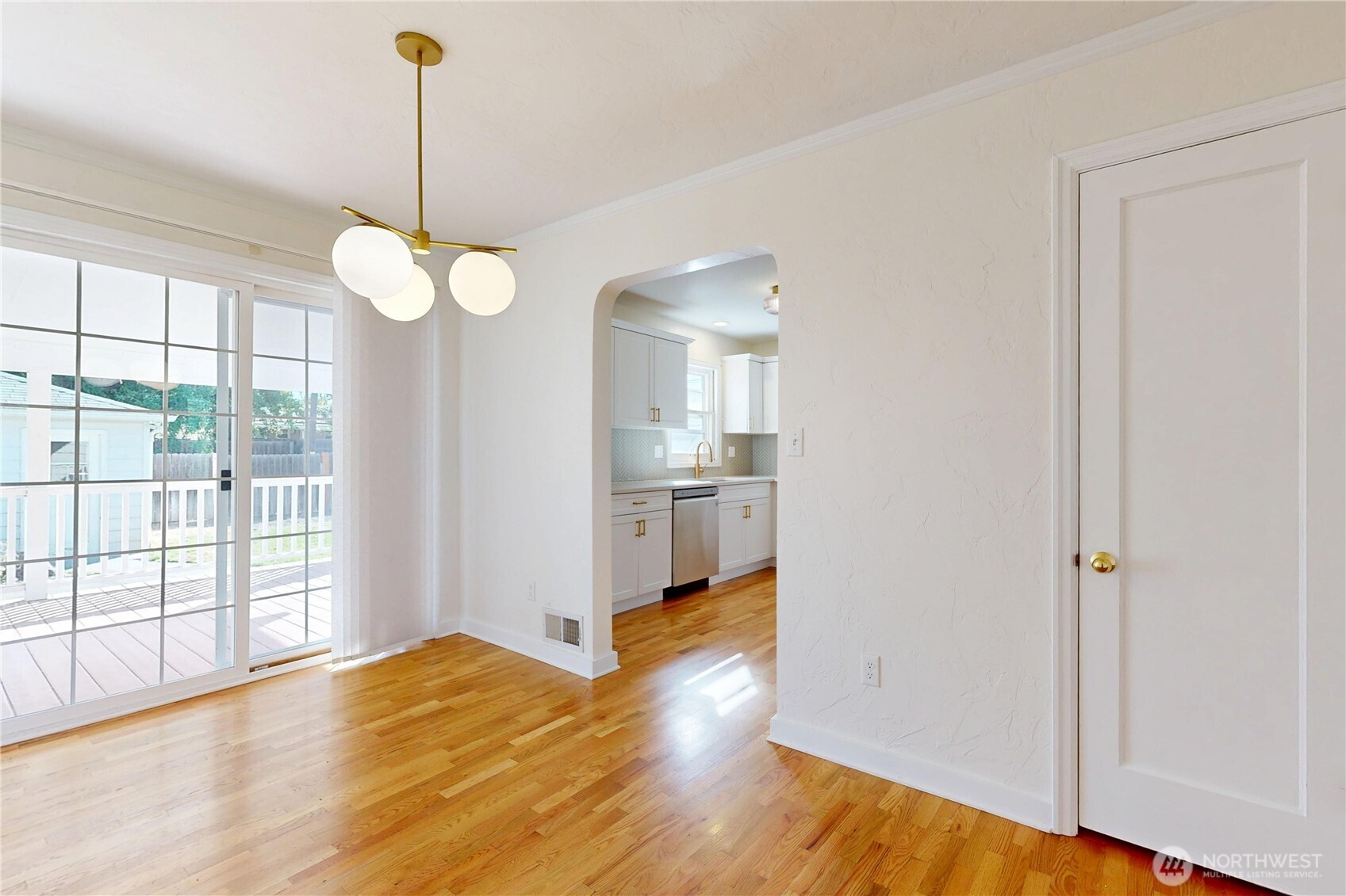 1303 Modoc Street Walla Walla, WA 99362 - Photo 16 of 40 a view of empty room with wooden floor and fan