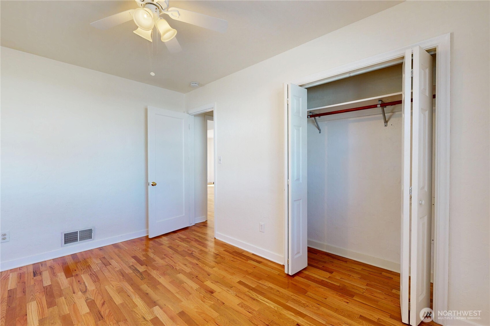 1303 Modoc Street Walla Walla, WA 99362 - Photo 23 of 40 a view of an empty room with wooden floor