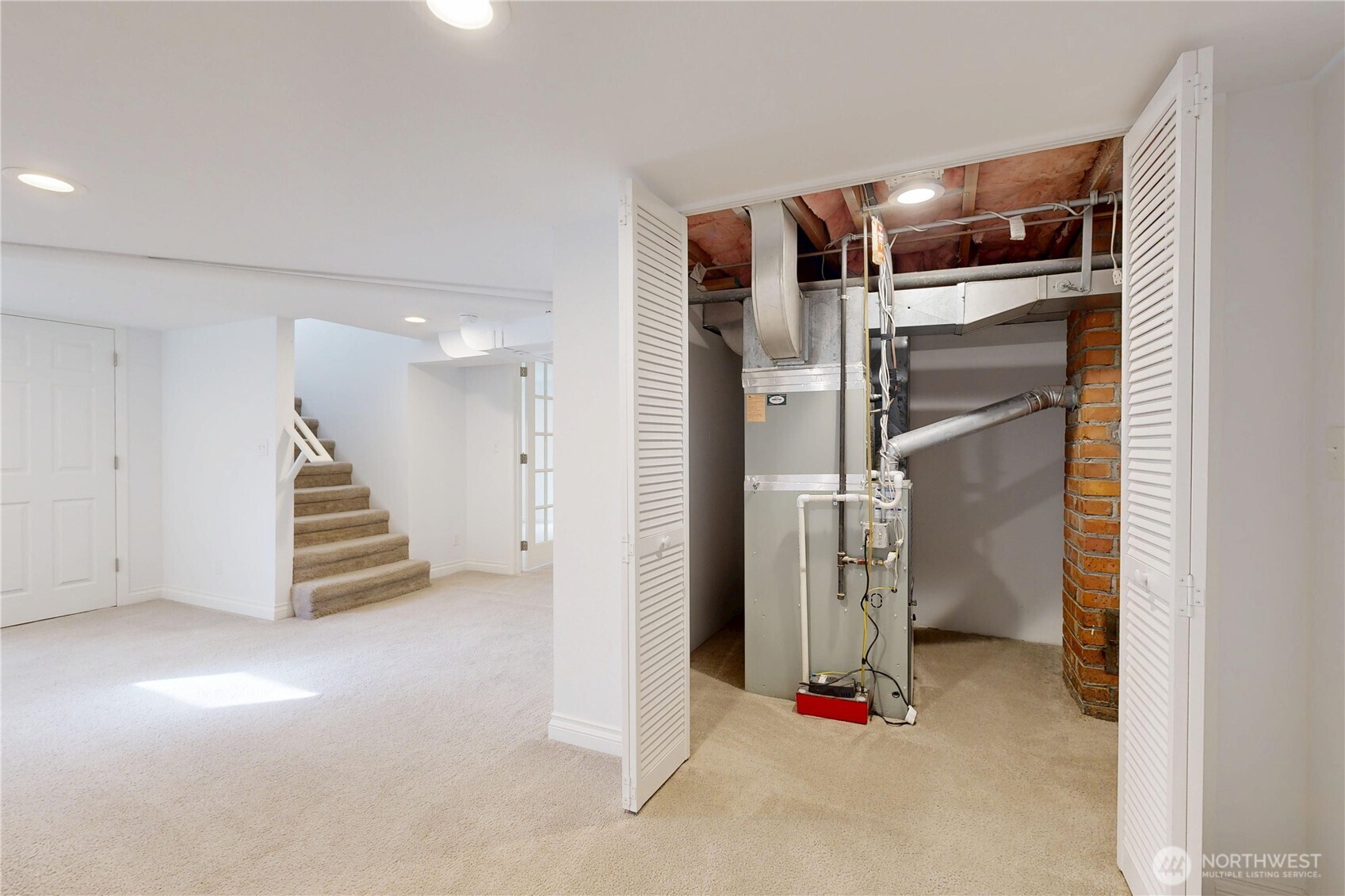1303 Modoc Street Walla Walla, WA 99362 - Photo 26 of 40 a view of room with stairs and wooden floor