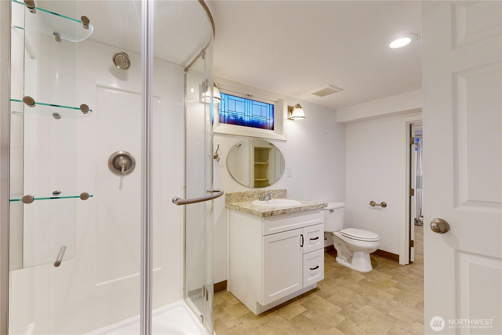 1303 Modoc Street Walla Walla, WA 99362 - Photo 31 of 40 a bathroom with a sink a toilet and shower